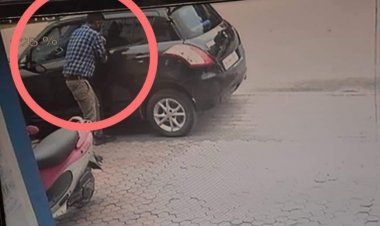 धनबाद: JMM नेता लीडर के कार का शीशा तोड़कर दिनदहाड़े ढाई लाख रुपये की चोरी,घटना CCTV में कैद